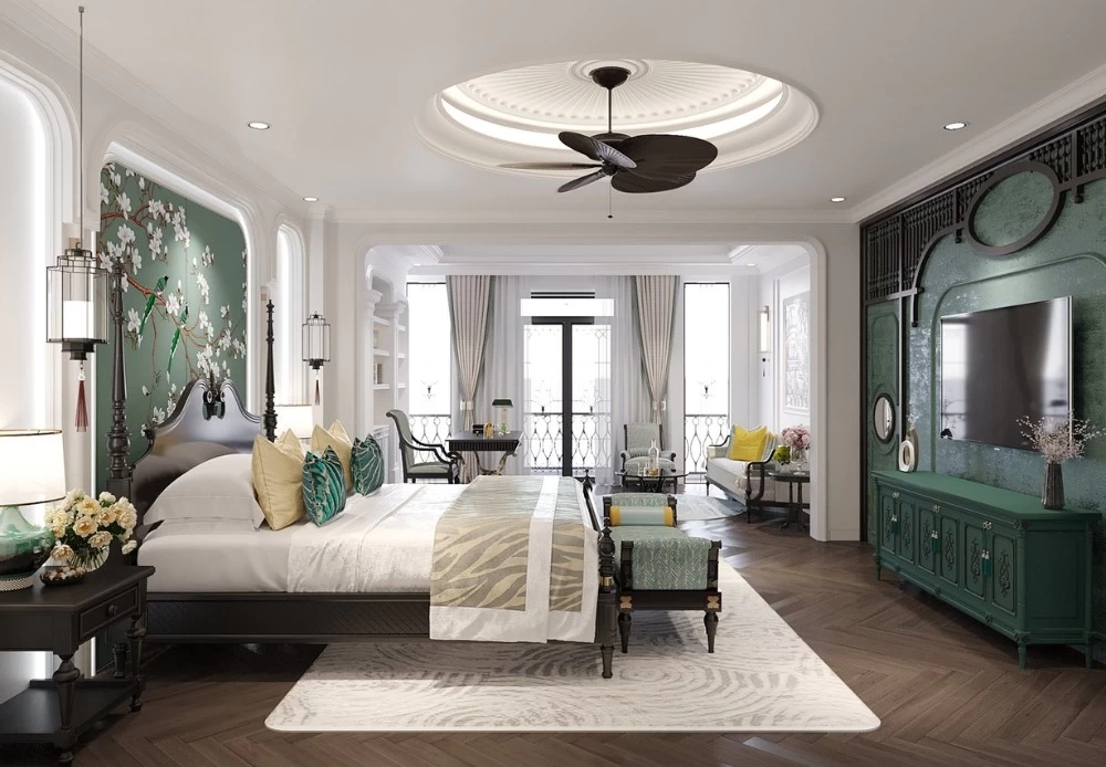 Phòng ngủ Indochine lấy tông màu trắng làm chủ đạo và có kết hợp một số mảng tường gam màu xanh lá