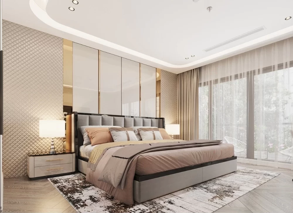 Vách tường màu vàng kim loại kết hợp ánh đèn ngủ tạo cảm giác sang trọng cho không gian phòng ngủ phụ