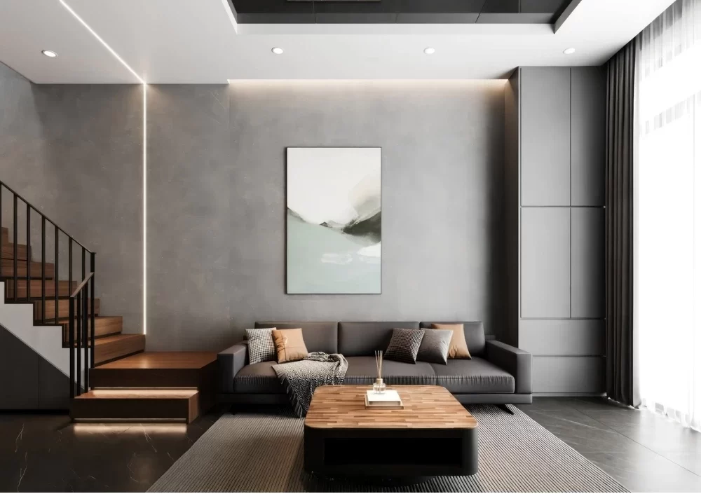 Phòng khách nhà phố diện tích 50m² có đặt bộ ghế sofa chữ I kê sát tường